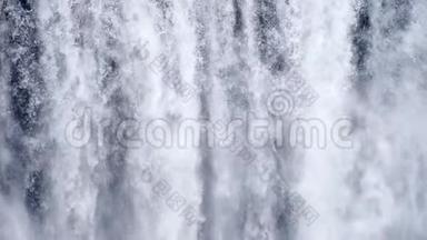 瀑布特写慢动作背景，斯科加福斯冰岛。抽象的水背景。真实的水纹理